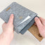 Hülle für PocketBook Touch Lux 5 | mit Magnetverschluss und extra Fach | hellgrau - Tracks | Modell "HAKA"