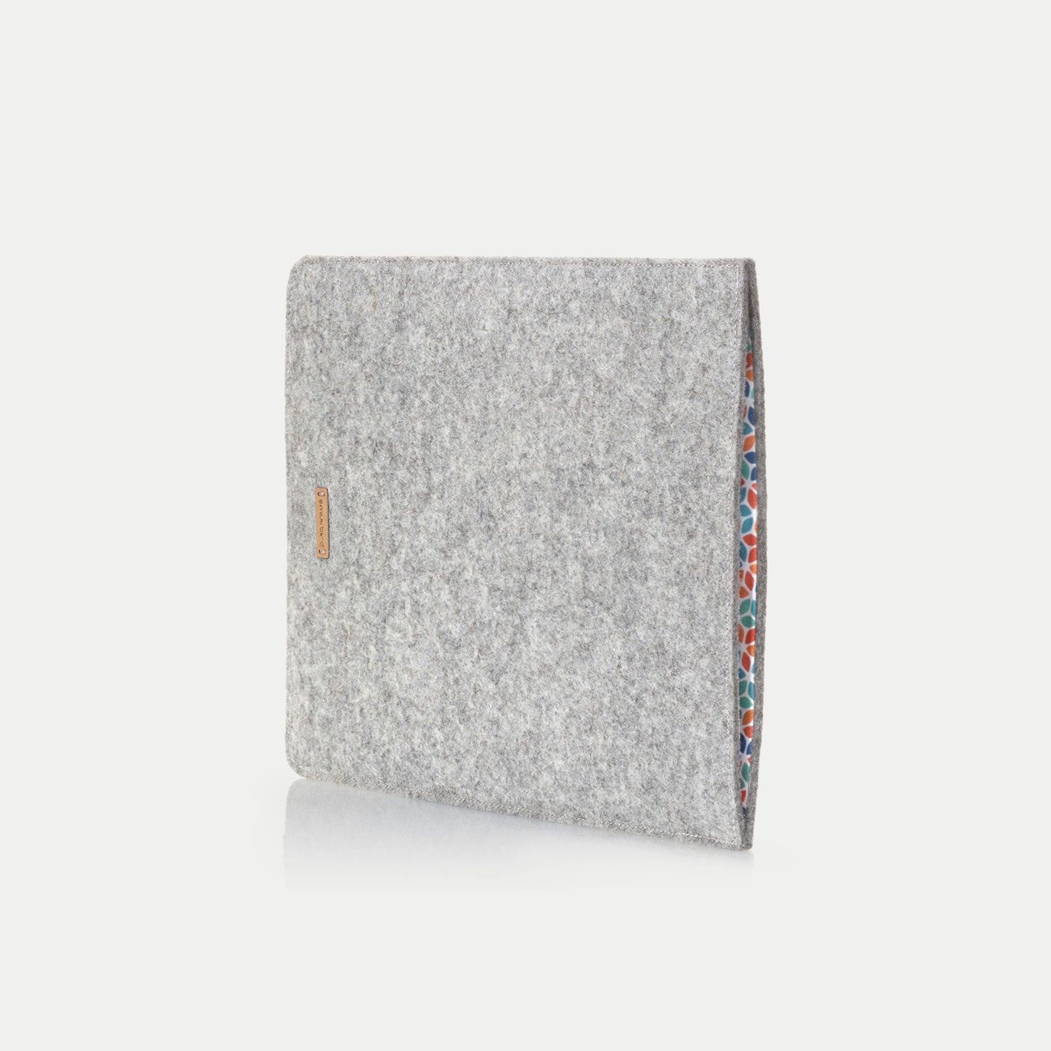 Custom made laptop sleeve made of felt light grey colorful